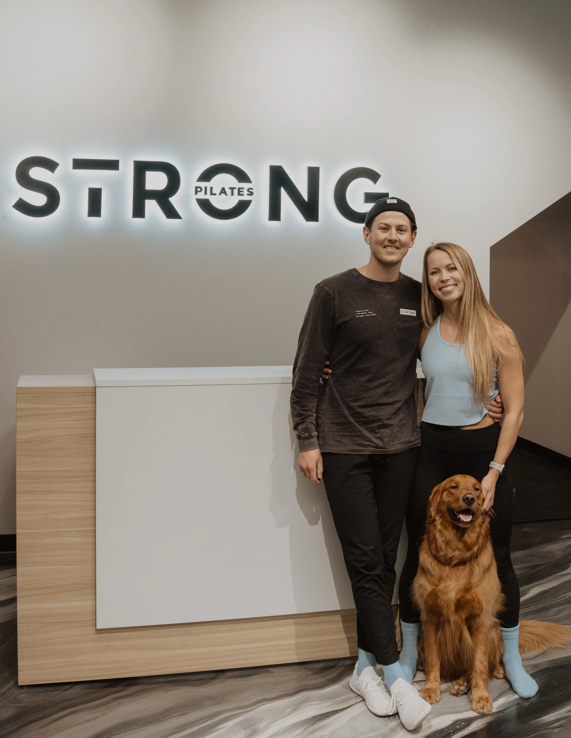 Riley and Marta together at the reception of their STRONG Kelowna studio